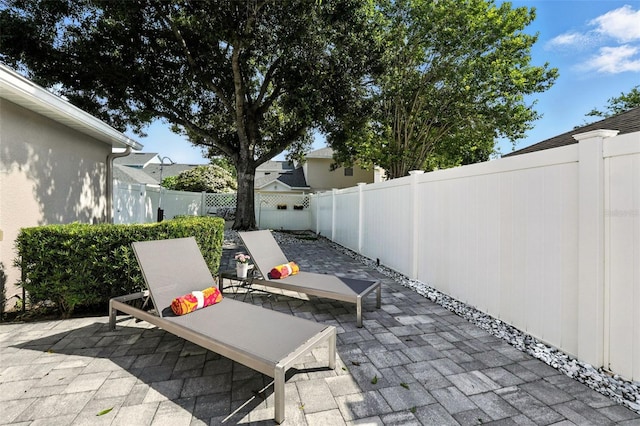 14241 Confetti Dr, Windermere, FL 34786 - fenced backyard with a patio area