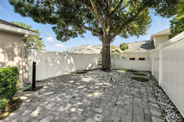 14241 Confetti Dr, Windermere, FL 34786 - fenced backyard featuring a patio