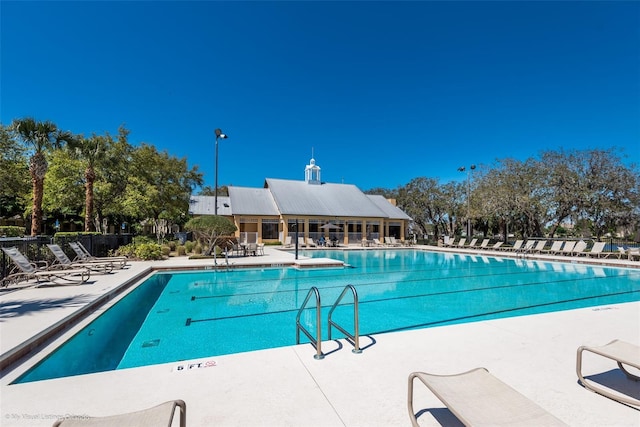 14241 Confetti Dr, Windermere, FL 34786 - community pool with a patio