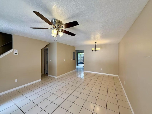 3370 Cedar Springs Pl Unit 156, Winter Park, FL 32792 - spare room with a textured ceiling, a ceiling fan, a chandelier, and light tile patterned floors