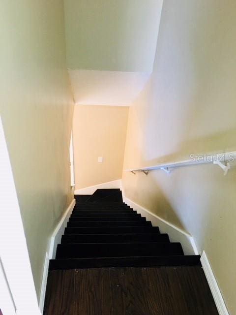 3370 Cedar Springs Pl Unit 156, Winter Park, FL 32792 - stairway featuring baseboards