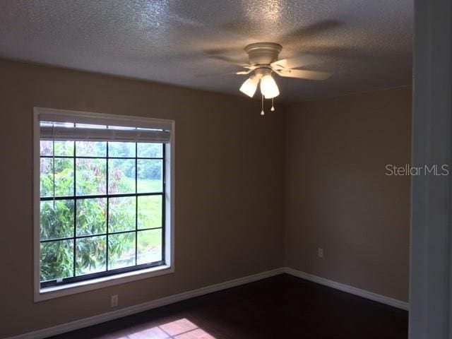 3370 Cedar Springs Pl Unit 156, Winter Park, FL 32792 - unfurnished room with a textured ceiling, plenty of natural light, and ceiling fan