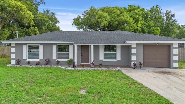 5310 Pineview Way, Apopka, FL 32703 - ranch-style home with roof with shingles, an attached garage, concrete driveway, and concrete block siding