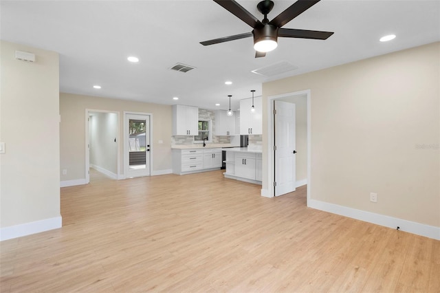 5310 Pineview Way, Apopka, FL 32703 - unfurnished living room featuring ceiling fan, light wood finished floors, and recessed lighting
