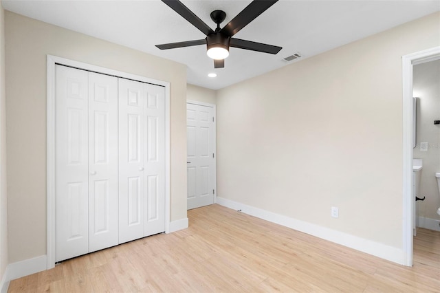 5310 Pineview Way, Apopka, FL 32703 - unfurnished bedroom with light wood-style floors, a closet, recessed lighting, a ceiling fan, and ensuite bath