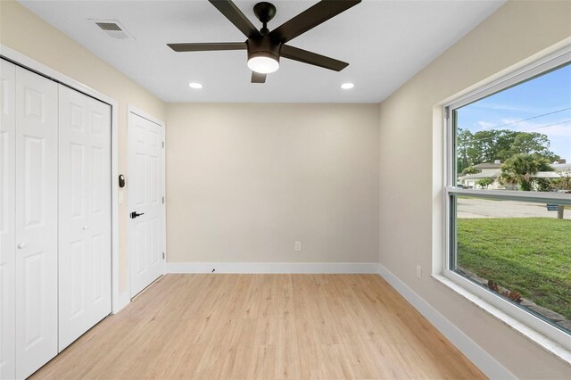 5310 Pineview Way, Apopka, FL 32703 - unfurnished bedroom featuring light wood-style flooring, recessed lighting, a closet, and a ceiling fan