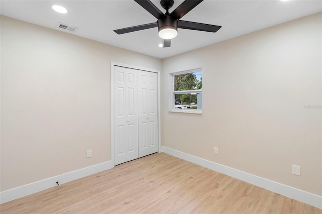5310 Pineview Way, Apopka, FL 32703 - unfurnished bedroom with light wood finished floors, recessed lighting, a closet, and ceiling fan