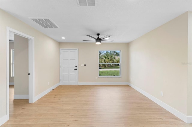 5310 Pineview Way, Apopka, FL 32703 - spare room with light wood-type flooring, a ceiling fan, and recessed lighting