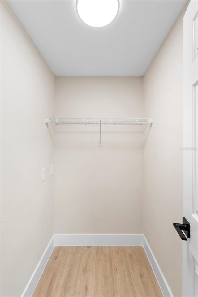 5310 Pineview Way, Apopka, FL 32703 - spacious closet with light wood-type flooring