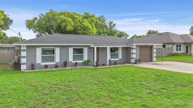 5310 Pineview Way, Apopka, FL 32703 - ranch-style home featuring a garage, concrete driveway, and roof with shingles