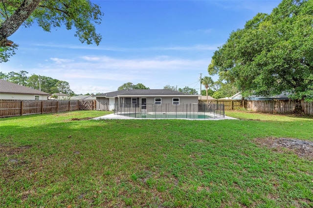 5310 Pineview Way, Apopka, FL 32703 - rear view of property featuring a fenced backyard and a patio