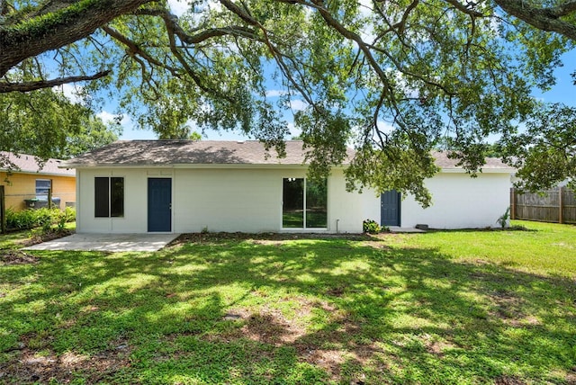 1838 Windmill Dr, Orlando, FL 32818 - back of house with a patio area