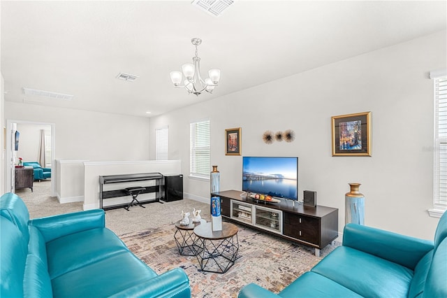 9518 Bolero Rd, Winter Garden, FL 34787 - carpeted living room featuring a chandelier and baseboards