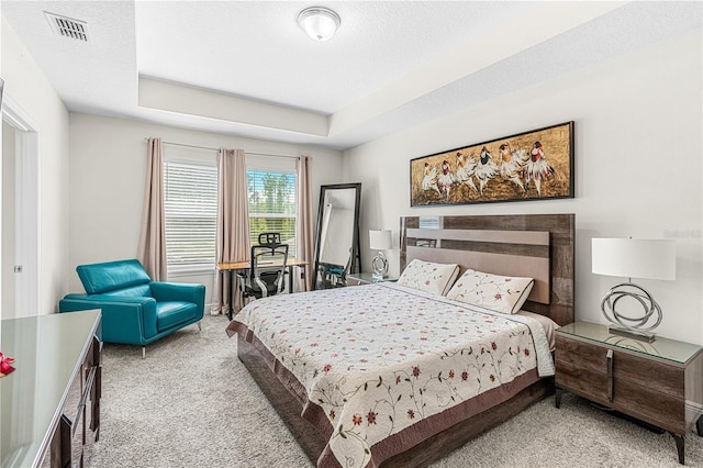 9518 Bolero Rd, Winter Garden, FL 34787 - carpeted bedroom with a tray ceiling