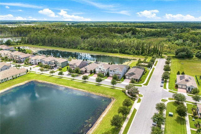 9518 Bolero Rd, Winter Garden, FL 34787 - aerial perspective of suburban area with a forest and a large body of water