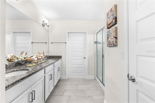 9518 Bolero Rd, Winter Garden, FL 34787 - bathroom with double vanity and a stall shower