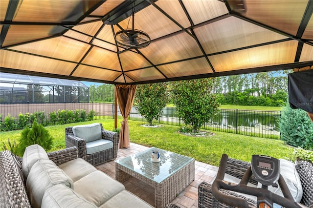 9518 Bolero Rd, Winter Garden, FL 34787 - fenced backyard featuring a water view, an outdoor living space, a gazebo, and a patio area