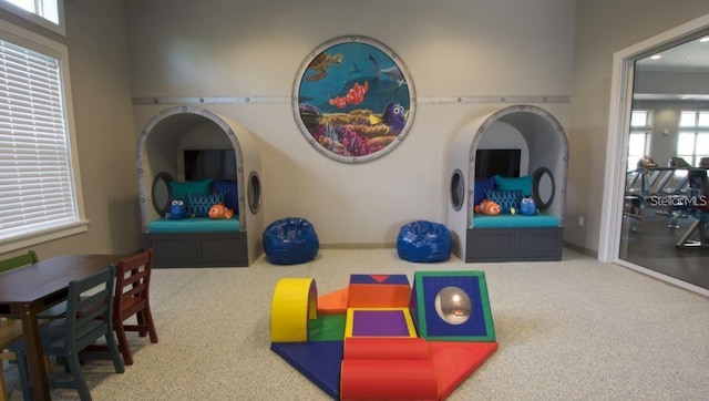 9518 Bolero Rd, Winter Garden, FL 34787 - playroom with carpet and healthy amount of natural light