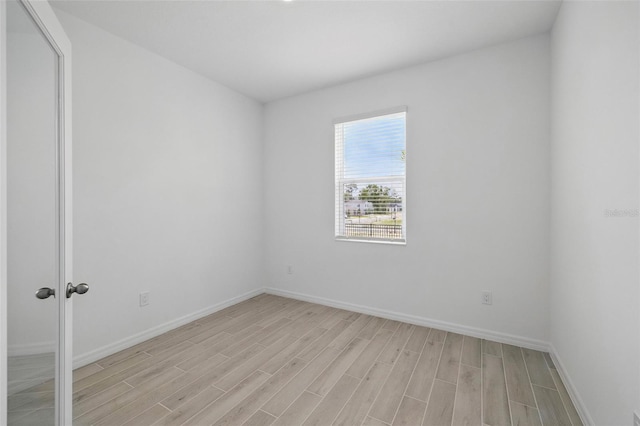 1198 Happy Forest Loop, Deland, FL 32720 - empty room with light wood-type flooring and baseboards