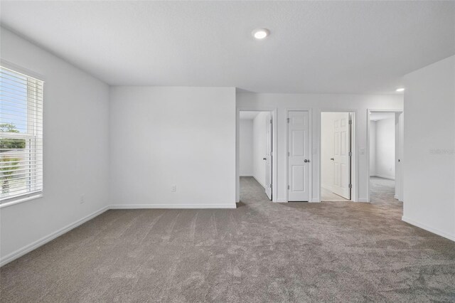 1198 Happy Forest Loop, Deland, FL 32720 - unfurnished bedroom featuring carpet and recessed lighting