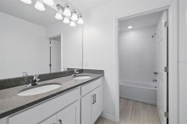 1198 Happy Forest Loop, Deland, FL 32720 - full bathroom featuring double vanity and  shower combination
