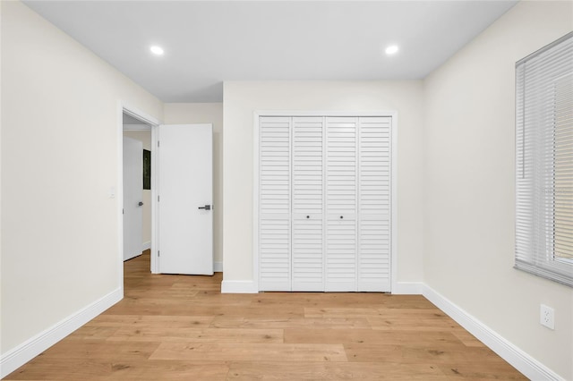 13412 NW 5th Ct, Plantation, FL 33325 - unfurnished bedroom featuring light wood-type flooring, a closet, and recessed lighting