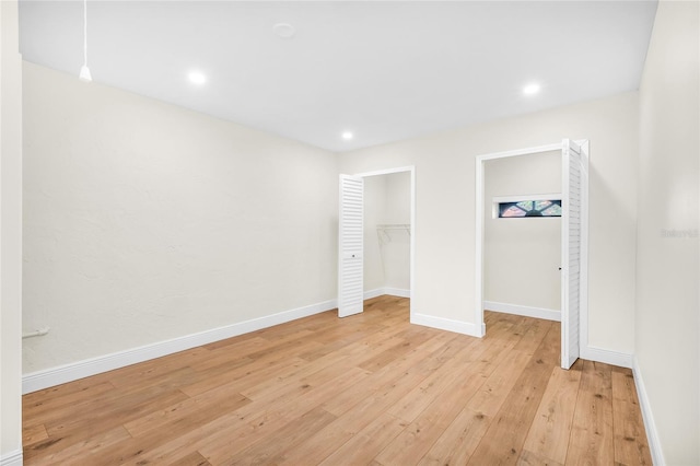 13412 NW 5th Ct, Plantation, FL 33325 - unfurnished bedroom featuring light wood-style flooring, recessed lighting, and multiple closets