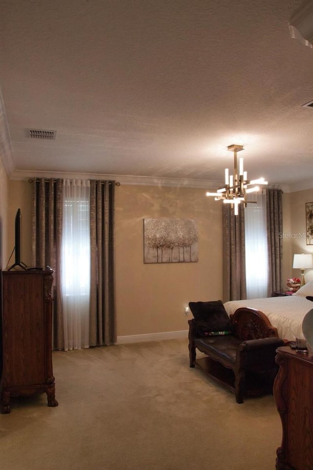 2851 Swoop Cir, Kissimmee, FL 34741 - bedroom featuring ornamental molding, a chandelier, and light colored carpet