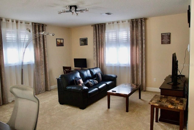 2851 Swoop Cir, Kissimmee, FL 34741 - living area featuring light carpet and baseboards