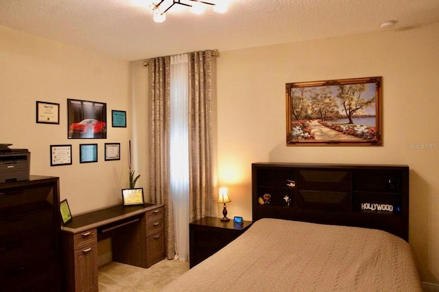 2851 Swoop Cir, Kissimmee, FL 34741 - bedroom with light colored carpet and a desk