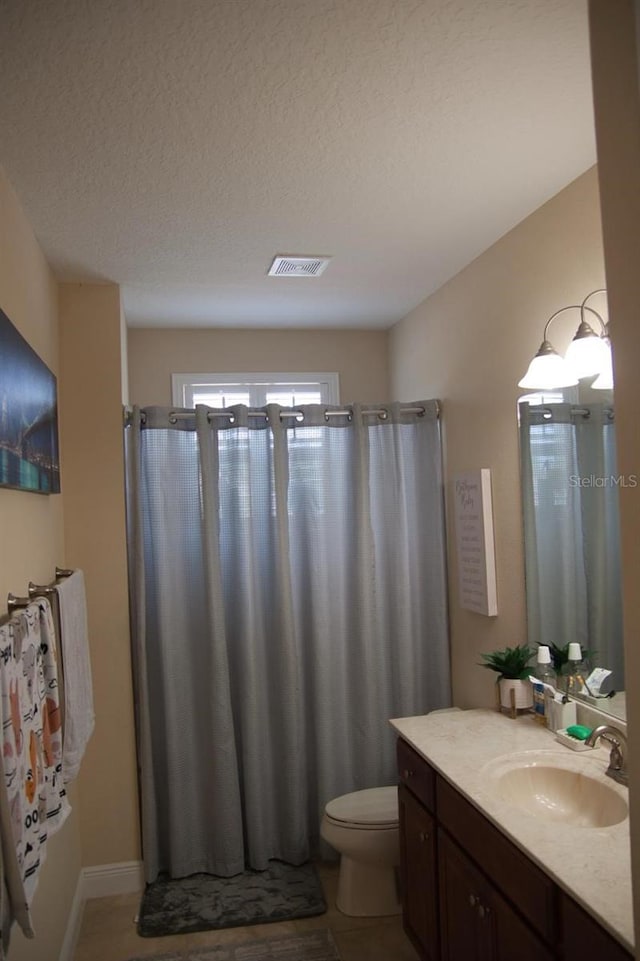 2851 Swoop Cir, Kissimmee, FL 34741 - full bathroom with vanity, a textured ceiling, and curtained shower