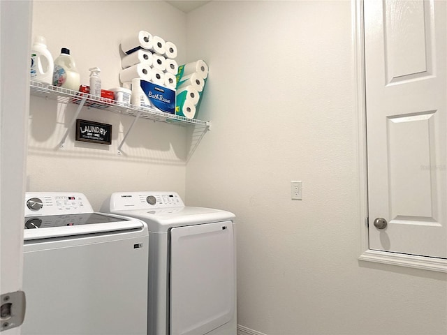 764 Richmond Estate Ave, Haines City, FL 33844 - laundry room with washing machine and clothes dryer