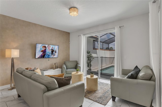 9005 Stinger Dr, Davenport, FL 33896 - living area with light marble finish flooring and baseboards