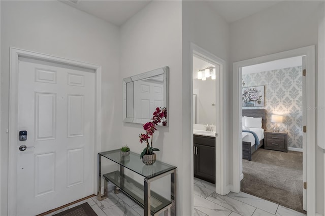 9005 Stinger Dr, Davenport, FL 33896 - entrance foyer featuring light marble finish flooring and baseboards