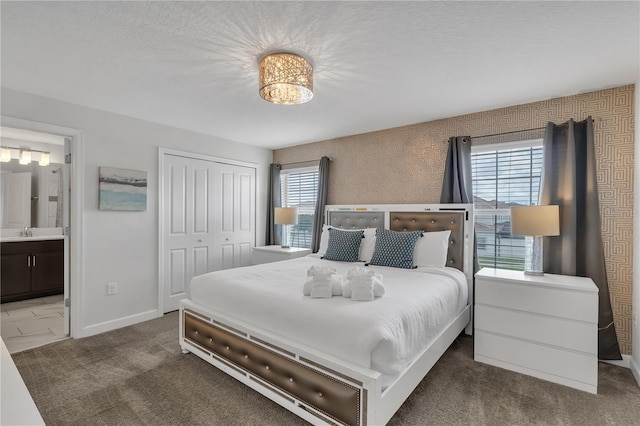 9005 Stinger Dr, Davenport, FL 33896 - carpeted bedroom with a closet and ensuite bathroom