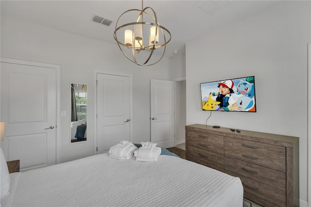 9005 Stinger Dr, Davenport, FL 33896 - bedroom featuring a chandelier and baseboards