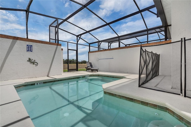9005 Stinger Dr, Davenport, FL 33896 - outdoor pool featuring a lanai and a patio area