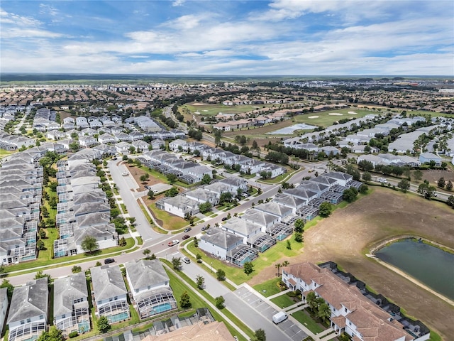 9005 Stinger Dr, Davenport, FL 33896 - aerial view of property and surrounding area with a large body of water and nearby suburban area