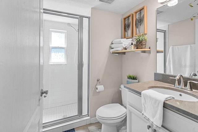 1210 Woods Landing Dr, Minneola, FL 34715 - bathroom with a stall shower, vanity, and tile patterned flooring