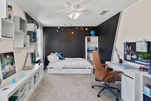 1210 Woods Landing Dr, Minneola, FL 34715 - bedroom with carpet, an office area, an accent wall, and ceiling fan