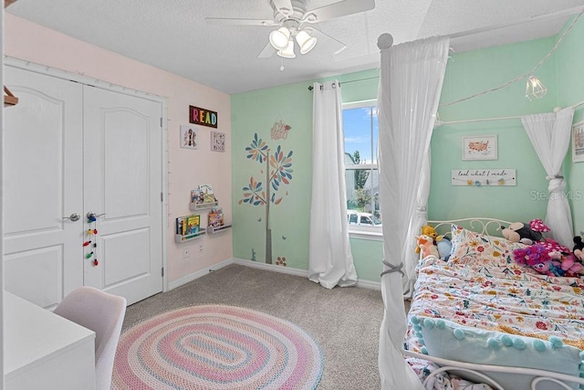 1210 Woods Landing Dr, Minneola, FL 34715 - bedroom featuring carpet, ceiling fan, and a textured ceiling