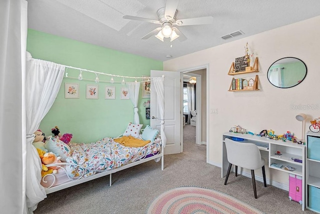 1210 Woods Landing Dr, Minneola, FL 34715 - bedroom with carpet flooring, a textured ceiling, and a ceiling fan