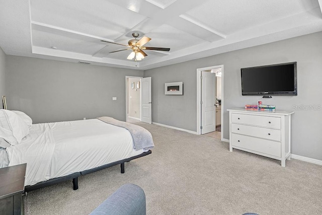1210 Woods Landing Dr, Minneola, FL 34715 - bedroom featuring coffered ceiling, light colored carpet, a ceiling fan, ensuite bath, and beam ceiling