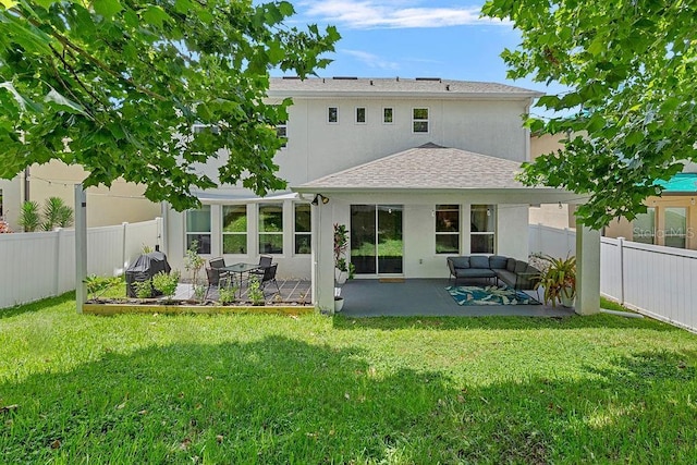 1210 Woods Landing Dr, Minneola, FL 34715 - rear view of property with a patio area, a fenced backyard, stucco siding, and an outdoor hangout area