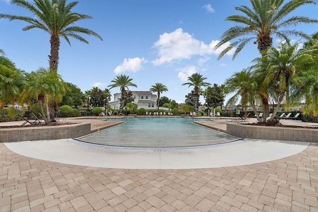 1210 Woods Landing Dr, Minneola, FL 34715 - community pool featuring a patio area