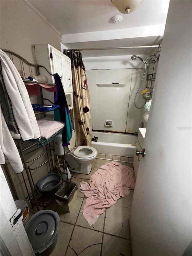 10004 Vaughn St, Gibsonton, FL 33534 - bathroom with shower / tub combo with curtain and tile patterned flooring
