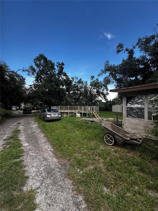10004 Vaughn St, Gibsonton, FL 33534 - view of yard with driveway