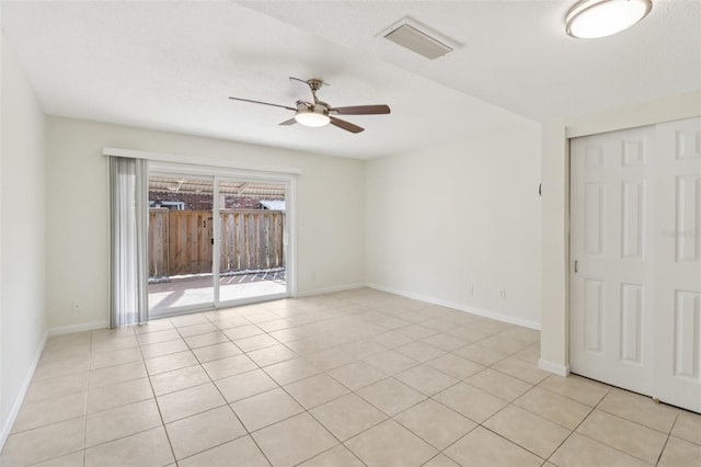 2200 S Palmetto Ave Unit B050, South Daytona, FL 32119 - empty room featuring ceiling fan and light tile patterned floors