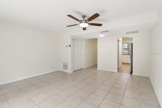 2200 S Palmetto Ave Unit B050, South Daytona, FL 32119 - empty room featuring ceiling fan and light tile patterned floors