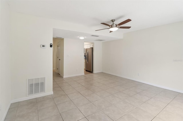 2200 S Palmetto Ave Unit B050, South Daytona, FL 32119 - empty room featuring a ceiling fan and light tile patterned flooring